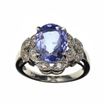 14KT. White Gold, 2.75CT Oval Cut Tanzanite And 0.26CT Diamond Ring