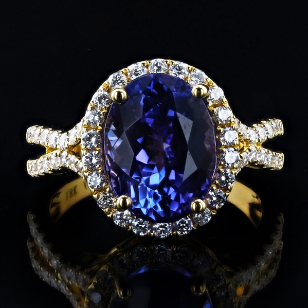 App: $15,730 5.82ct Tanzanite and 0.69ctw Diamond 18K Yellow Gold Ring (Vault_R50) 