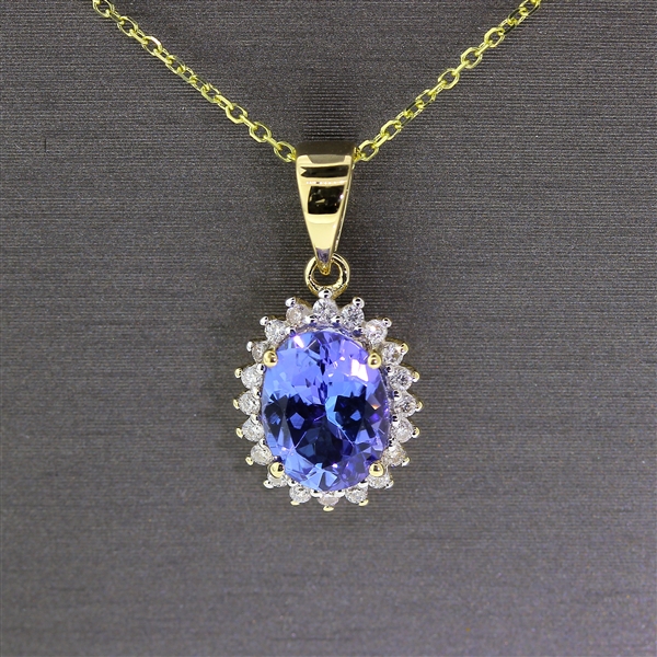 Tanzanite Oval Cut 1 Carat Center Stone Surrounded by Diamonds with Yellow Gold Chain! (Vault_Q)