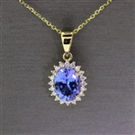 Tanzanite Oval Cut 1 Carat Center Stone Surrounded by Diamonds with Yellow Gold Chain! (Vault_Q)