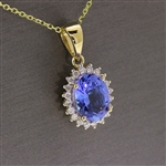 Tanzanite Oval Cut 1 Carat Center Stone Surrounded by Diamonds with Yellow Gold Chain! (Vault_Q)