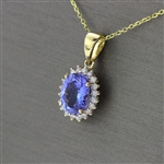 Tanzanite Oval Cut 1 Carat Center Stone Surrounded by Diamonds with Yellow Gold Chain! (Vault_Q)