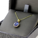 Tanzanite Oval Cut 1 Carat Center Stone Surrounded by Diamonds with Yellow Gold Chain! (Vault_Q)