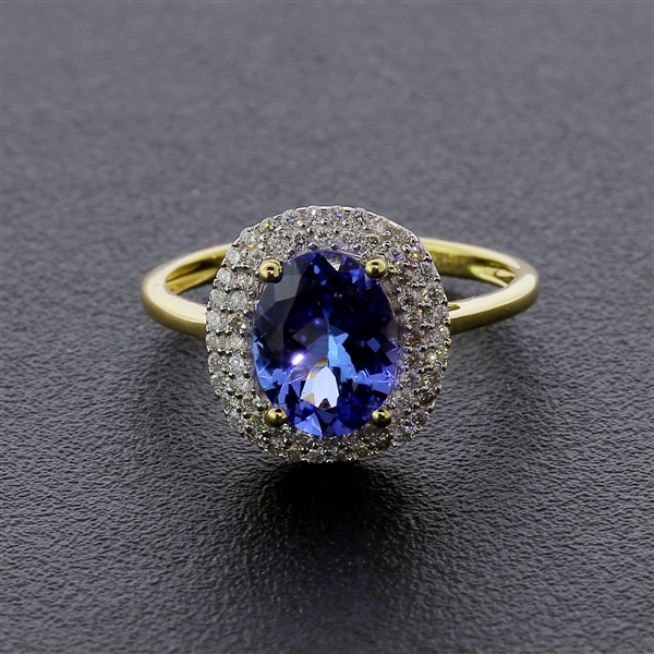 Auction Opportunity! Breathtaking Yellow Gold Ring with Center 1.41 Carat Oval Tanzanite and Nice Diamonds! (Vault_Q)